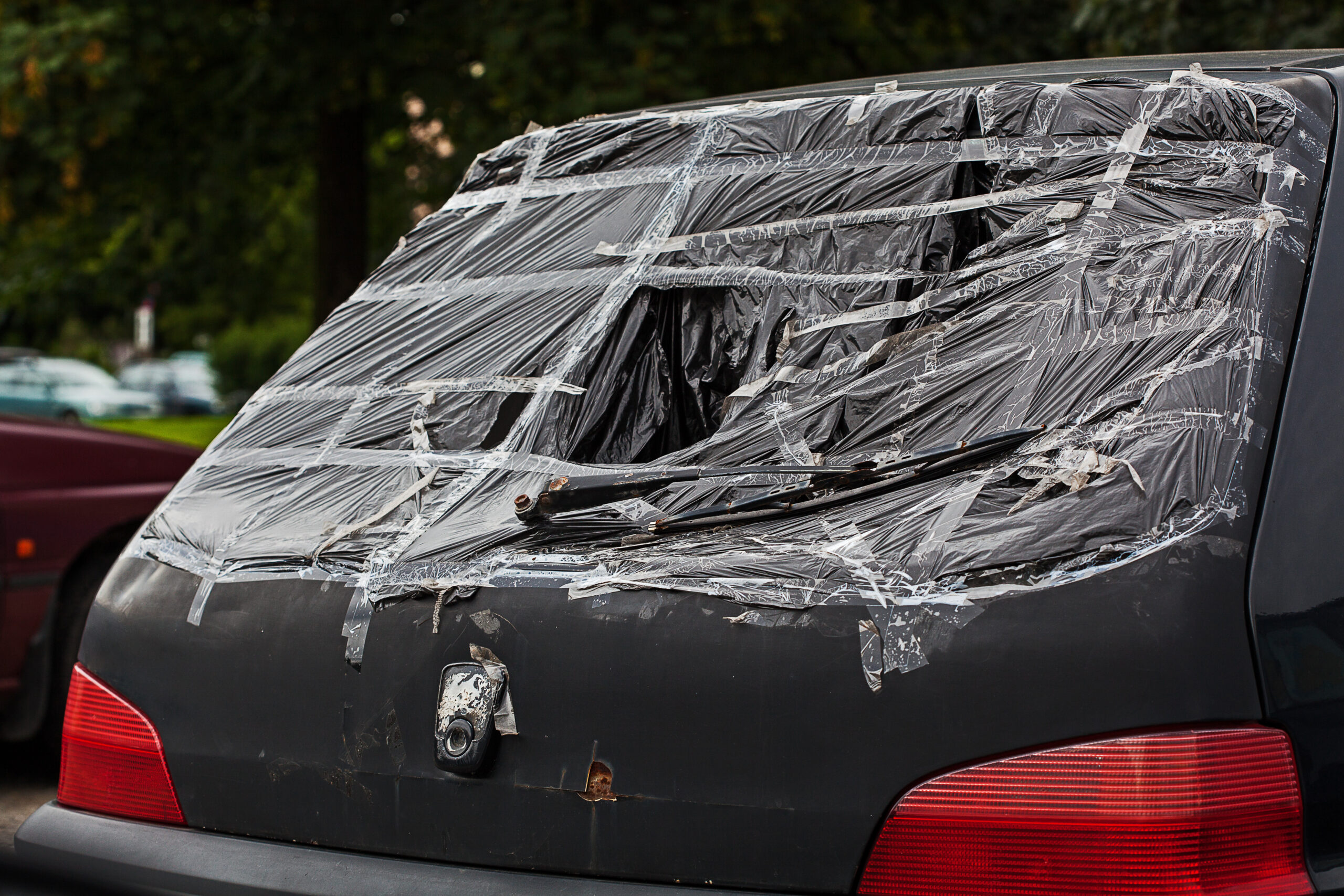 Broken rear car window in need of replacement